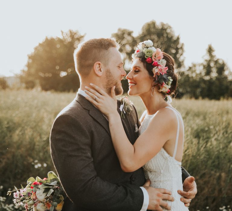 Pink flower crown for bride at garden wedding