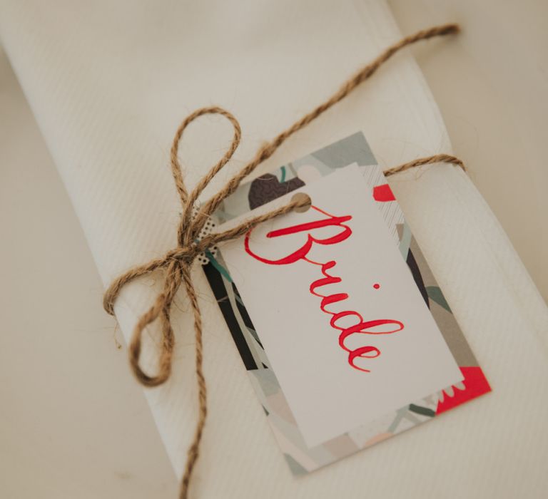 Wedding place setting in marquee