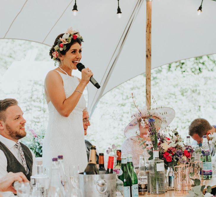 Bride speech with Bridal party in different bridesmaid dresses with hoop bouquets