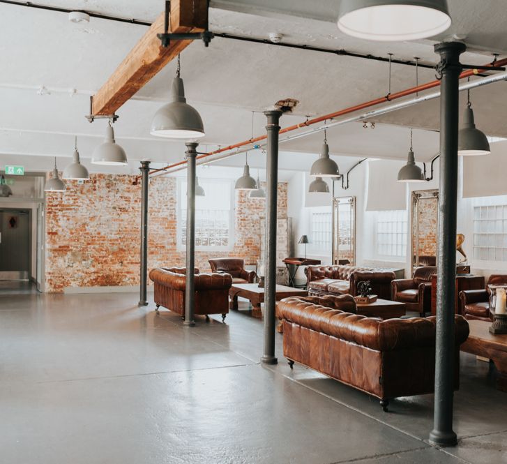 Pink Roll Top Booze Bath and Copper &amp; Perspex Wedding Decor at Industrial Venue The West Mill | Rosie Kelly Photography