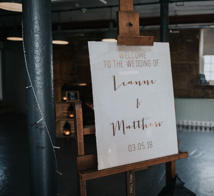 Acrylic Wedding Welcome Sign | Pink Roll Top Booze Bath and Copper &amp; Perspex Wedding Decor at Industrial Venue The West Mill | Rosie Kelly Photography