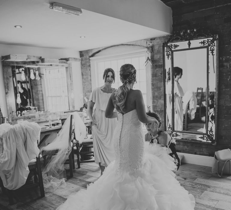 Wedding Morning Bridal Preparations | Bride in Fishtail Allure Bridal Gown | Pink Roll Top Booze Bath and Copper &amp; Perspex Wedding Decor at Industrial Venue The West Mill | Rosie Kelly Photography