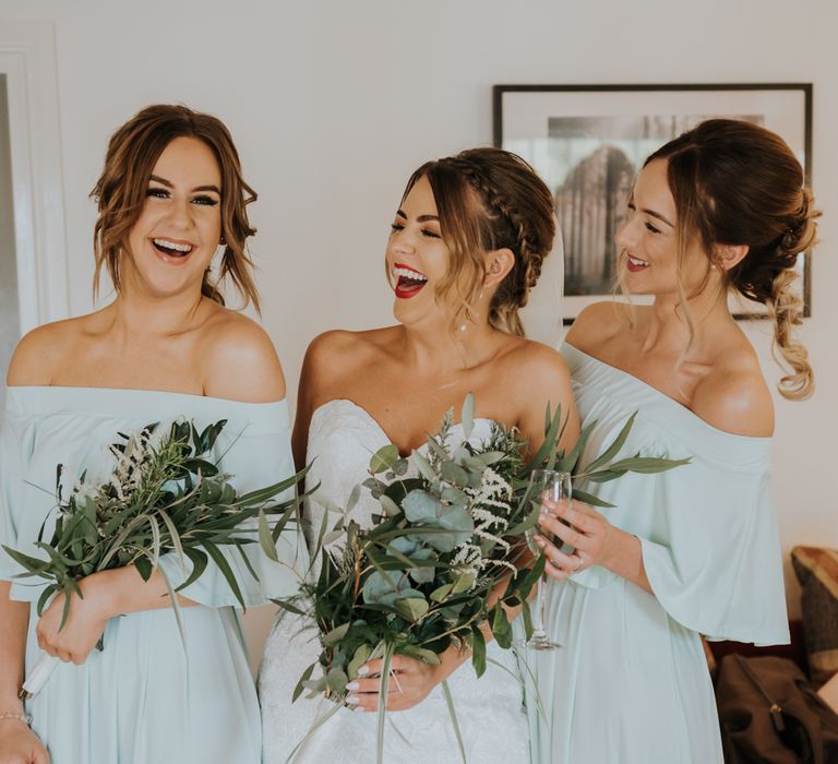 Bridal Party | Bride in Fishtail Allure Bridal Gown | Bridesmaids in Green off the Shoulder Sheln Dresses | Pink Roll Top Booze Bath and Copper &amp; Perspex Wedding Decor at Industrial Venue The West Mill | Rosie Kelly Photography