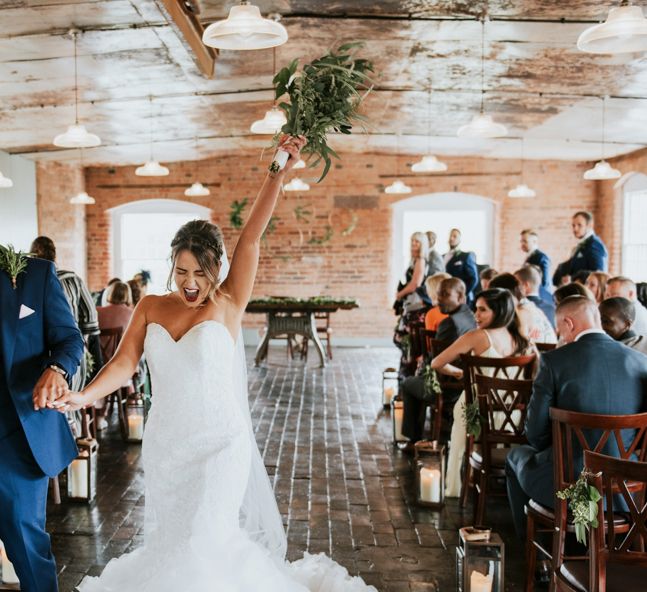 Wedding Ceremony | Bride in Fishtail Allure Bridal Gown | Groom in Navy Ted Baker Suit | Pink Roll Top Booze Bath and Copper &amp; Perspex Wedding Decor at Industrial Venue The West Mill | Rosie Kelly Photography