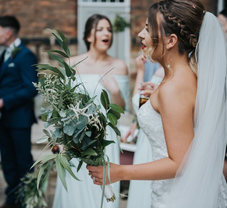 Greenery Wedding Bouquet | Bride in Fishtail Allure Bridal Gown | Pink Roll Top Booze Bath and Copper &amp; Perspex Wedding Decor at Industrial Venue The West Mill | Rosie Kelly Photography