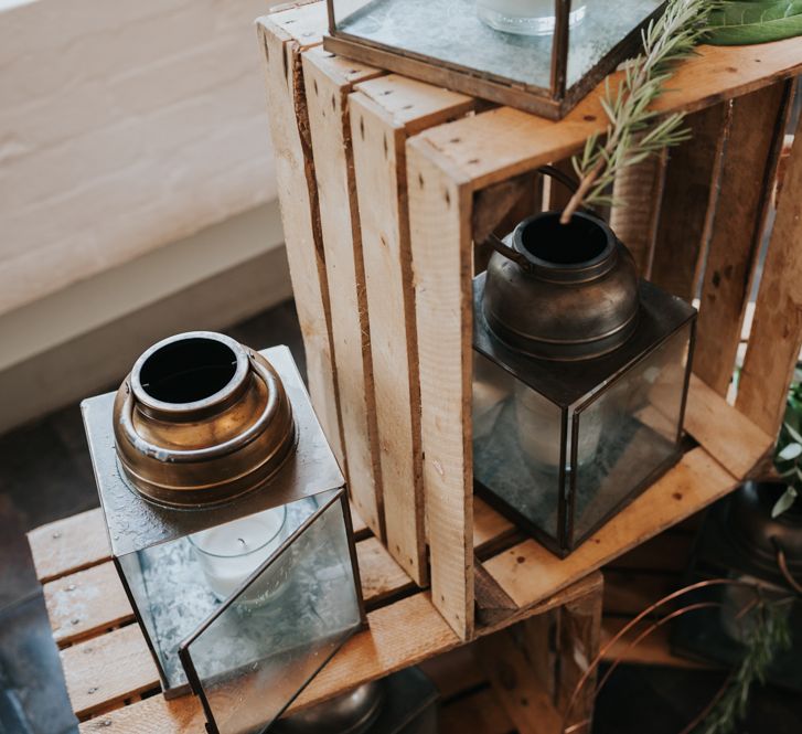 Lanterns in Wooden Crates Wedding Decor | Pink Roll Top Booze Bath and Copper &amp; Perspex Wedding Decor at Industrial Venue The West Mill | Rosie Kelly Photography