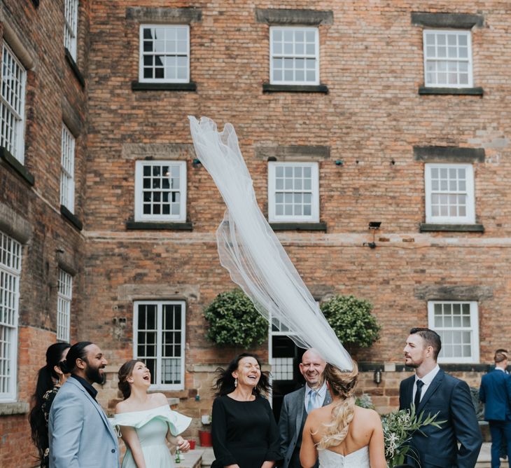 Bride in Fishtail Allure Bridal Gown | Pink Roll Top Booze Bath and Copper &amp; Perspex Wedding Decor at Industrial Venue The West Mill | Rosie Kelly Photography