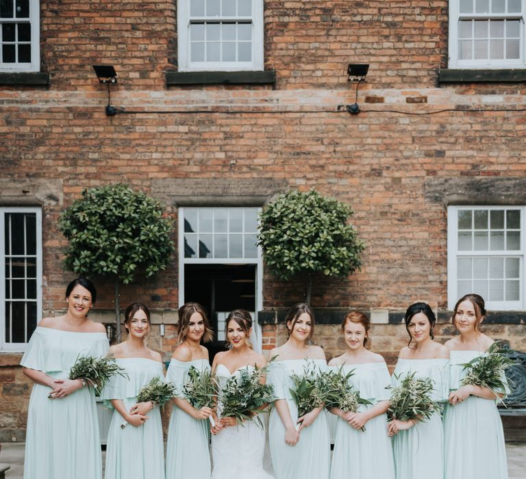 Bridal Party | Bridesmaids in Mint Green Bardot Dresses from Sheln | Bride in Fishtail Allure Bridal Gown | Pink Roll Top Booze Bath and Copper &amp; Perspex Wedding Decor at Industrial Venue The West Mill | Rosie Kelly Photography