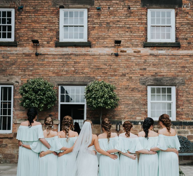 Bridal Party | Bridesmaids in Mint Green Bardot Dresses from Sheln | Bride in Fishtail Allure Bridal Gown | Pink Roll Top Booze Bath and Copper &amp; Perspex Wedding Decor at Industrial Venue The West Mill | Rosie Kelly Photography