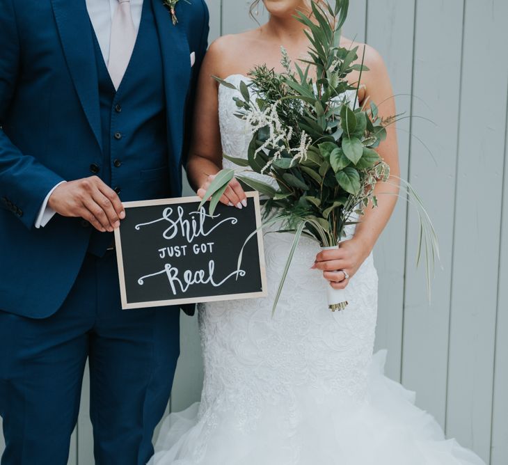 Bride in Fishtail Allure Bridal Gown | Groom in Navy Ted Baker Suit | Pink Roll Top Booze Bath and Copper &amp; Perspex Wedding Decor at Industrial Venue The West Mill | Rosie Kelly Photography