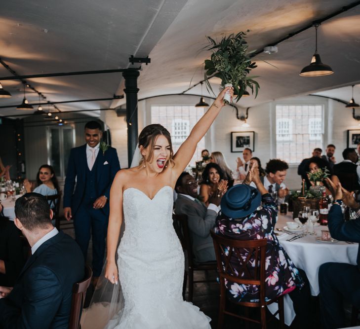 Bride in Fishtail Allure Bridal Gown | Groom in Navy Ted Baker Suit | Pink Roll Top Booze Bath and Copper &amp; Perspex Wedding Decor at Industrial Venue The West Mill | Rosie Kelly Photography