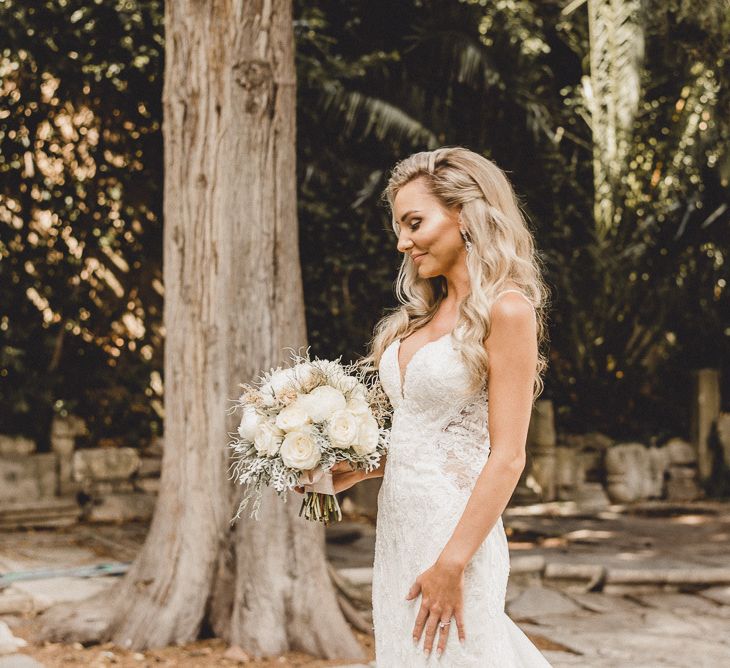 Essense of Australia wedding dress with white rose bouquet