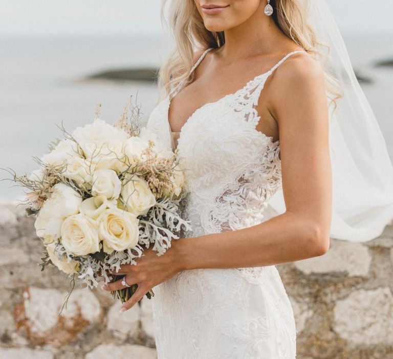 Essense of Australia wedding dress with hair down and drop earrings