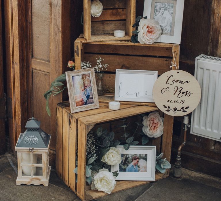 Rustic Wedding Photo Display For Wedding // Pink Ruffled Chair Covers For Romantic Pastel Pink Wedding At Dorton House With Bride In La Sposa And Images From Julia &amp; You Photography