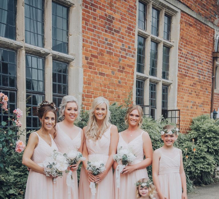 Pastel Pink Bridesmaids Dresses // Pink Ruffled Chair Covers For Romantic Pastel Pink Wedding At Dorton House With Bride In La Sposa And Images From Julia &amp; You Photography