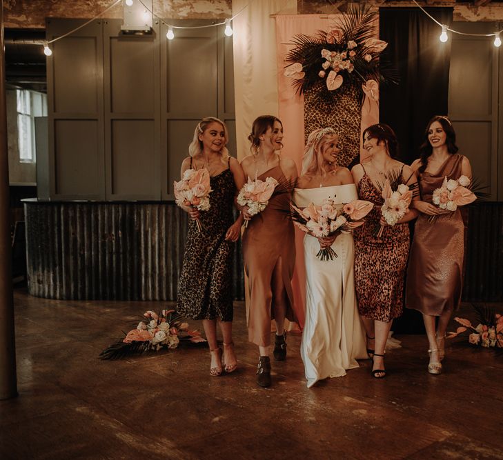 Silk leopard print bridesmaid dresses and complementing tones