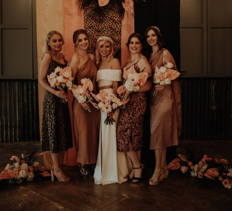 Stylish bridal party in leopard print bridesmaid dresses