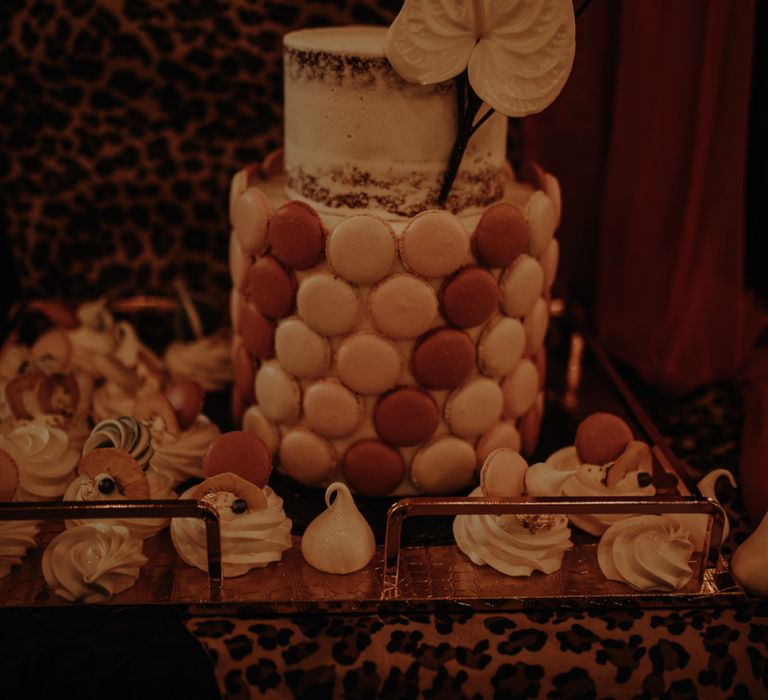 Wedding cake with macaroon decor and anthurium flower