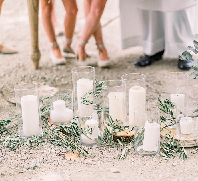 Olive branches and candles wedding decor