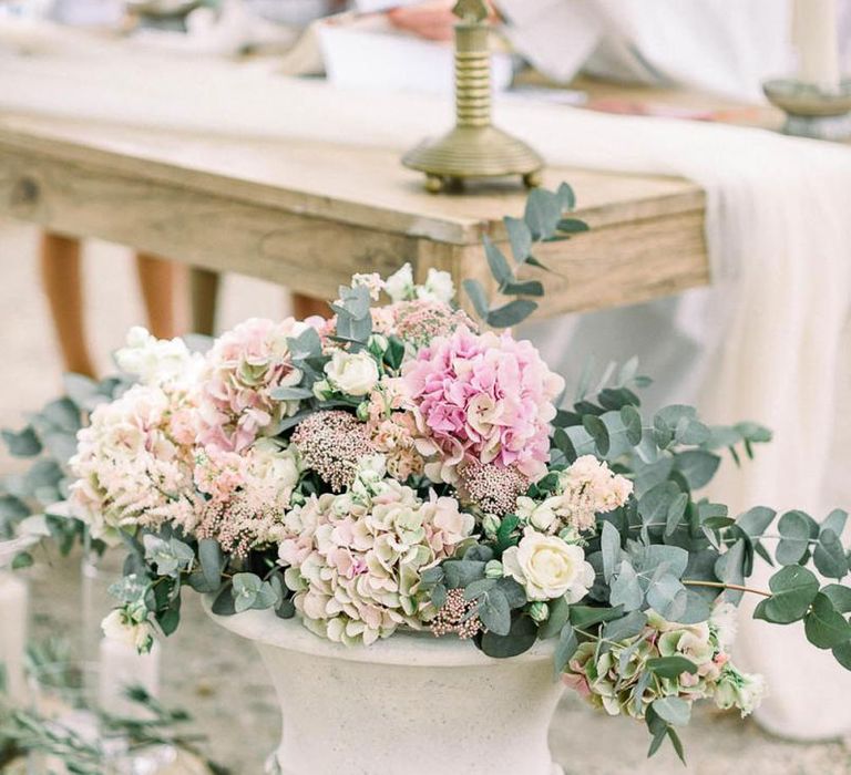 Romantic pink hydrangea and eucalyptus flower arrangement