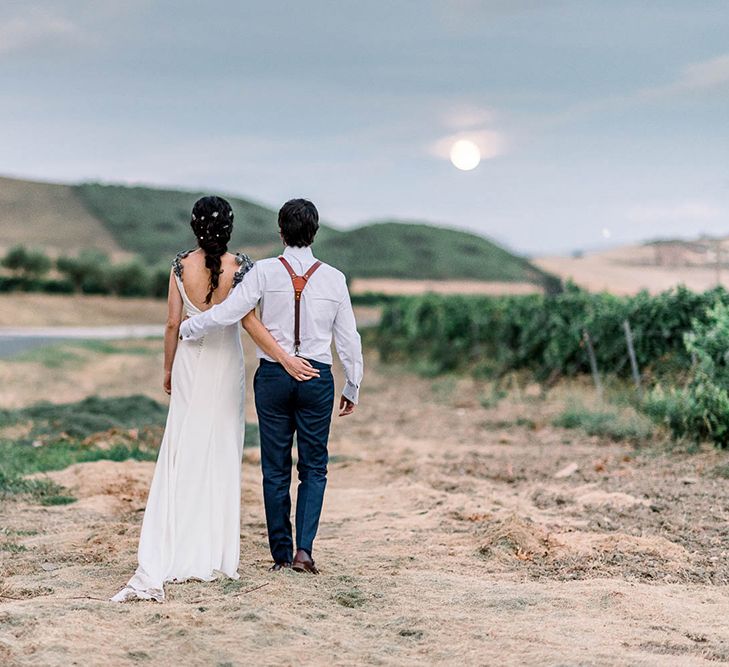 Bride and groom embracing