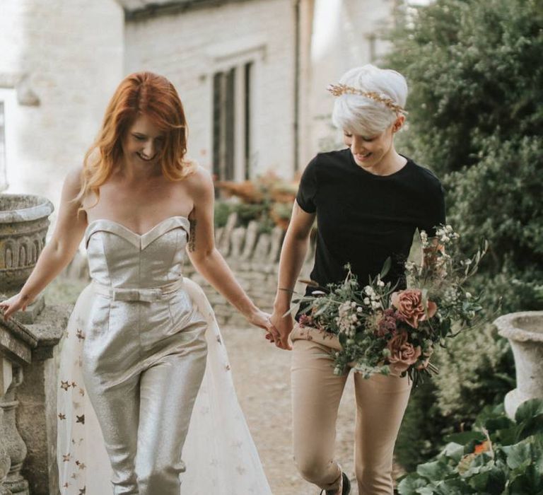 Bride with short hair wearing a gold crown and black t-shirt