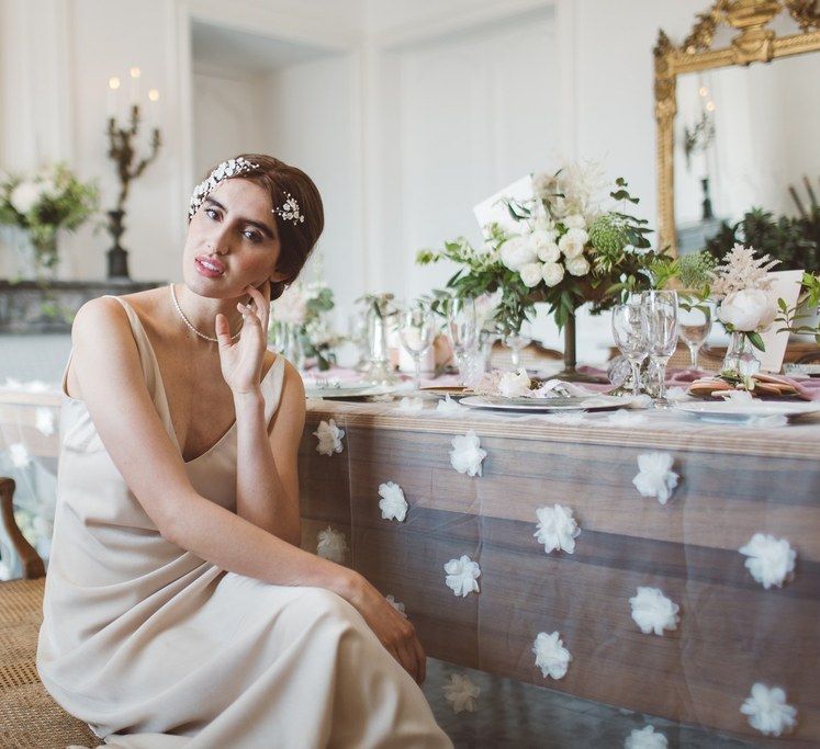 Charlie Brear Bridal Gown | Hermione Harbutt Headdress | L'heure Opulente - Laid Back French Chic, Paired with Elegant British Twists by Simply Pergord Weddings at Le Jardin à La Française Chateau | Mathilde Dufraisse Photography