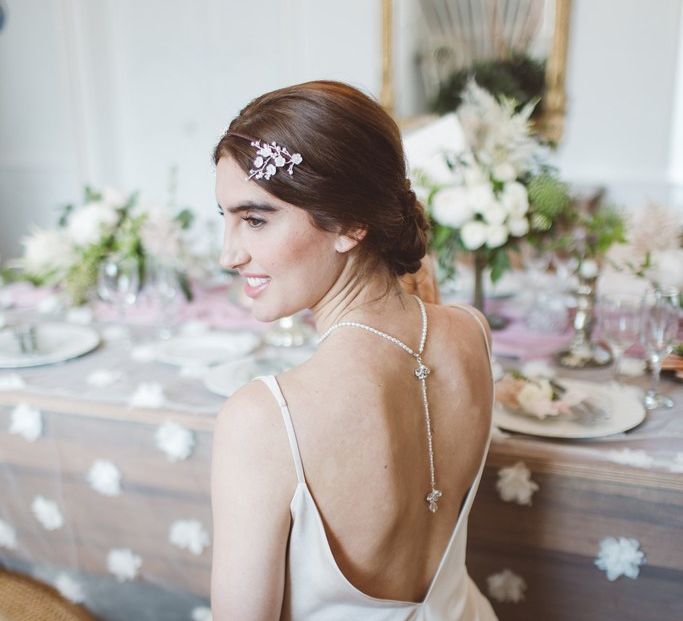 Charlie Brear Backless Bridal Gown | Hermione Harbutt Headdress | L'heure Opulente - Laid Back French Chic, Paired with Elegant British Twists by Simply Pergord Weddings at Le Jardin à La Française Chateau | Mathilde Dufraisse Photography