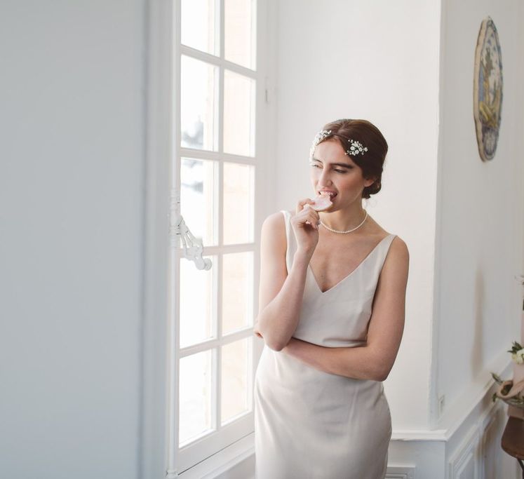 Charlie Brear Bridal Gown | Hermione Harbutt Headdress | L'heure Opulente - Laid Back French Chic, Paired with Elegant British Twists by Simply Pergord Weddings at Le Jardin à La Française Chateau | Mathilde Dufraisse Photography