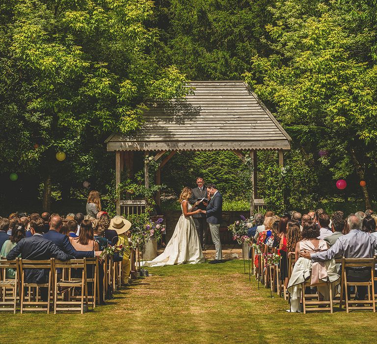 Wedding Ceremony | Bride in Separates | Groom in Navy Suit | Pennard House Outdoor Country Garden Wedding | Howell Jones Photography