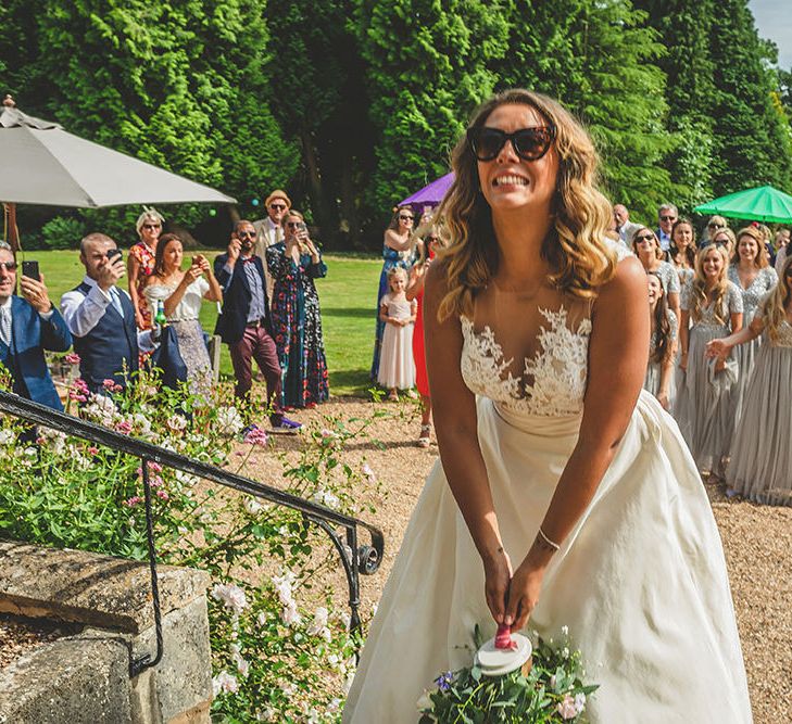 Bouquet Toss | Bride in Separates | Helena Fortley Lace Top | Pennard House Outdoor Country Garden Wedding | Howell Jones Photography