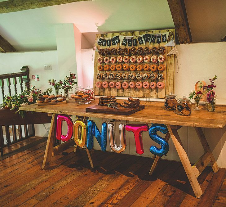 Doughnut Wall | Wedding Dessert | Pennard House Outdoor Country Garden Wedding | Howell Jones Photography