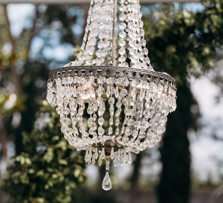 Chandelier Wedding Decor | Luxe Blush Pink Glasshouse Wedding at Cortal Gran, Spain Planned by La Puta Suegra  | Sara Lobla Photography