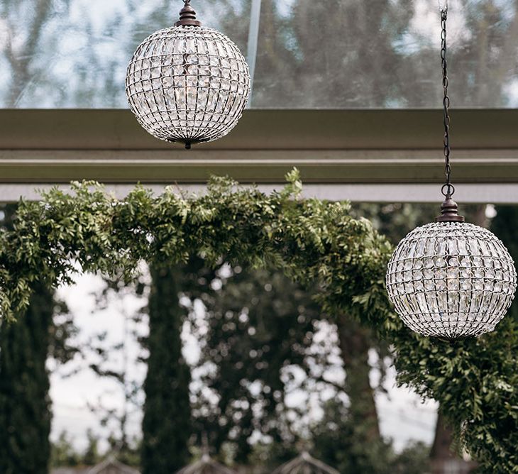 Chandelier Wedding Decor | Luxe Blush Pink Glasshouse Wedding at Cortal Gran, Spain Planned by La Puta Suegra  | Sara Lobla Photography