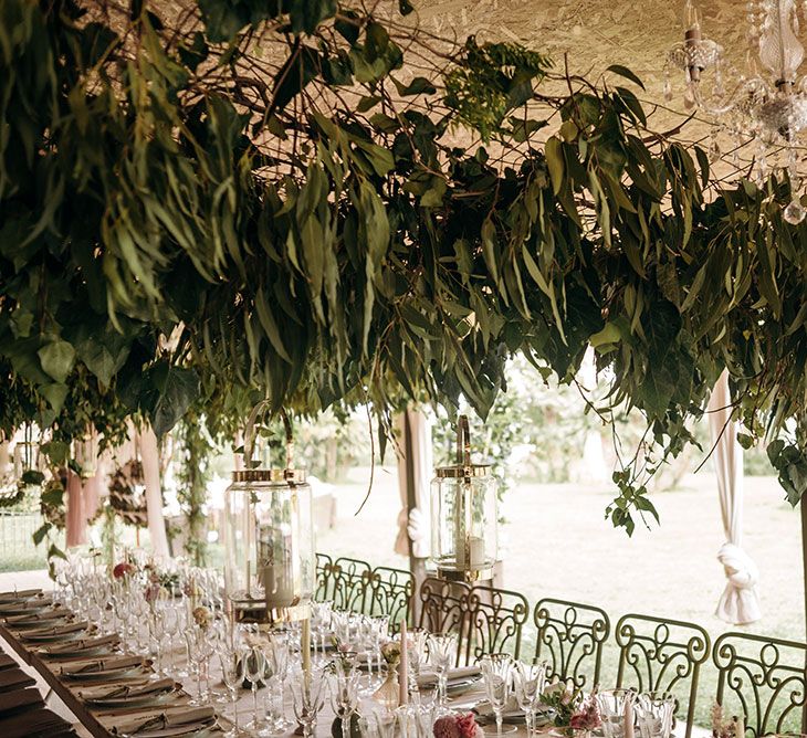 Foliage Hanging Installation over Reception Table | Luxe Blush Pink Glasshouse Wedding at Cortal Gran, Spain Planned by La Puta Suegra  | Sara Lobla Photography