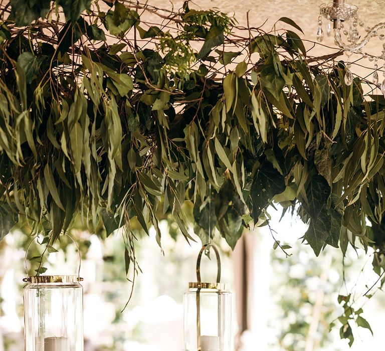 Foliage Hanging Installation over Reception Table | Luxe Blush Pink Glasshouse Wedding at Cortal Gran, Spain Planned by La Puta Suegra  | Sara Lobla Photography