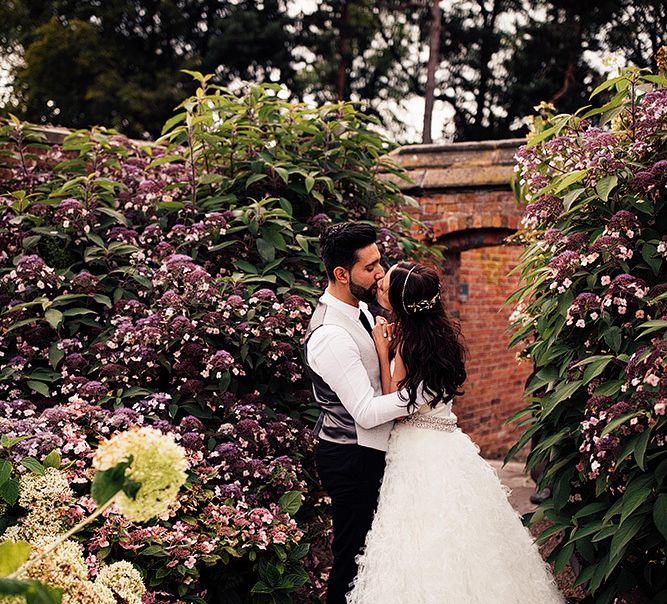 Intimate wedding portrait in Dorfold Hall gardens