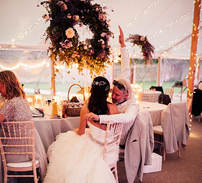 Bride in pronovnas wedding skirt at Dorfold Hall wedding reception