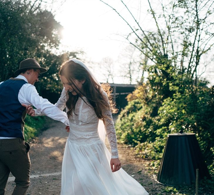 Nancarrow Farm Cornwall Wedding With Images From Dale Weeks &amp; Bride In Maggie Sottero With Wild Flower Bouquet &amp; Hand Knitted Flower Girl Outfit