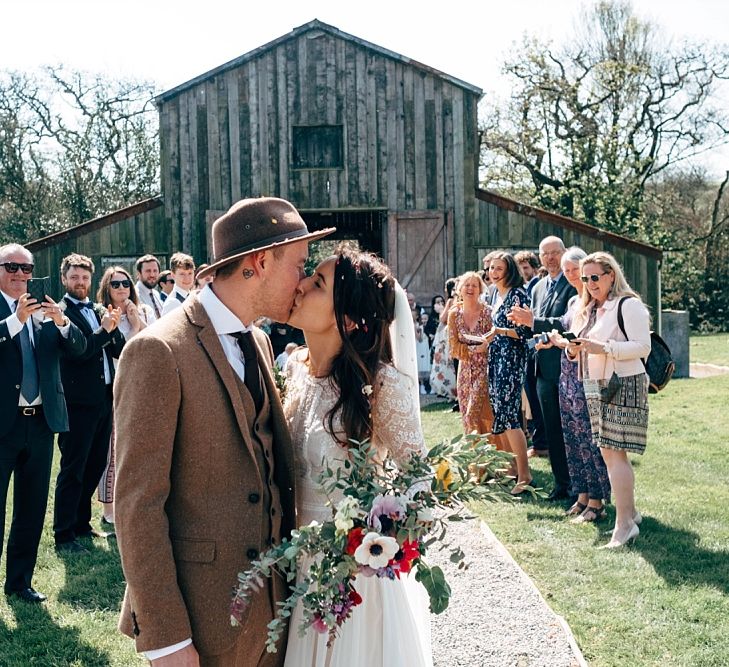 Just Married // Rusty Barn Wedding Ceremony Space At Nancarrow Farm // Nancarrow Farm Cornwall Wedding With Images From Dale Weeks &amp; Bride In Maggie Sottero With Wild Flower Bouquet &amp; Hand Knitted Flower Girl Outfit