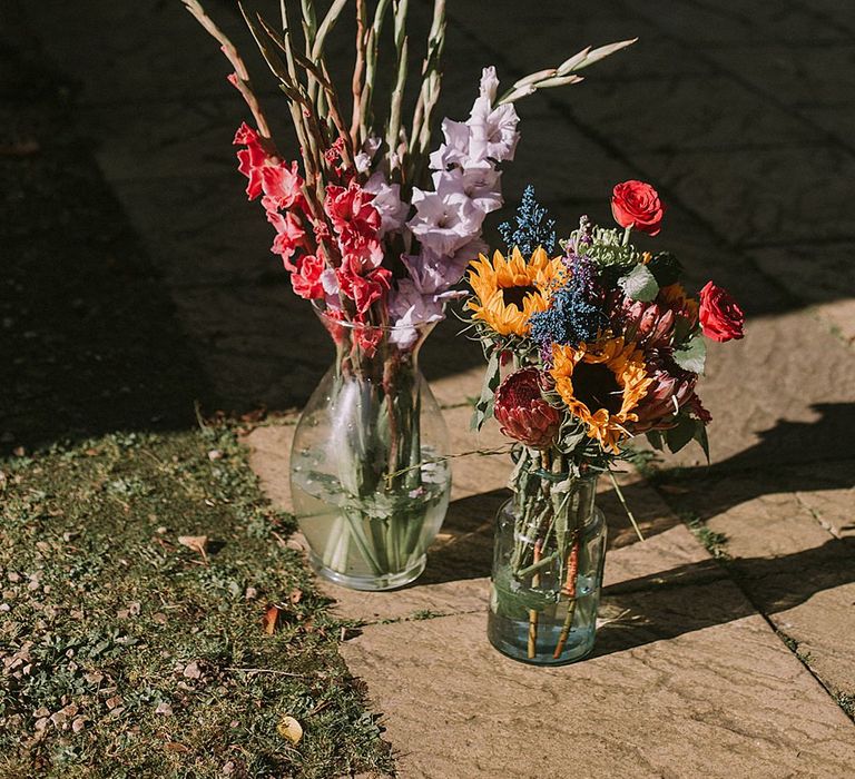 Hand Picked Garden Flowers in Bottles | Autumnal Scottish Woodland Wedding at Fernie Castle | Maureen Du Preez Photography