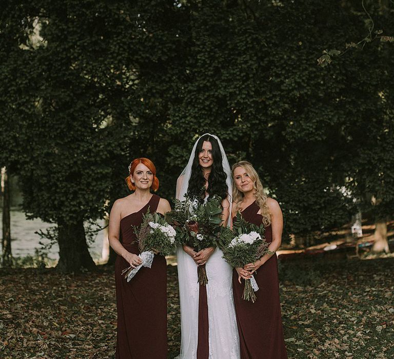 Bridal Party | Bride in Enzoani Gown | Bridesmaids in Burgundy Sorella Vita Bridesmaid Dresses | Autumnal Scottish Woodland Wedding at Fernie Castle | Maureen Du Preez Photography