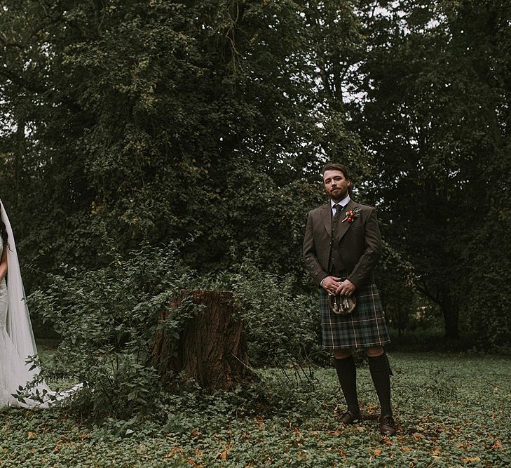 Bride in Enzoani Gown | Groom in Tartan Kilt | Autumnal Scottish Woodland Wedding at Fernie Castle | Maureen Du Preez Photography