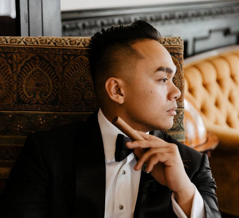 Groom preparations for black and white colour scheme wedding