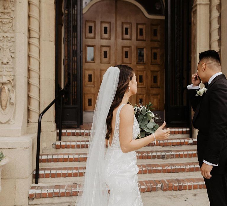 Bride and groom first look at LA wedding