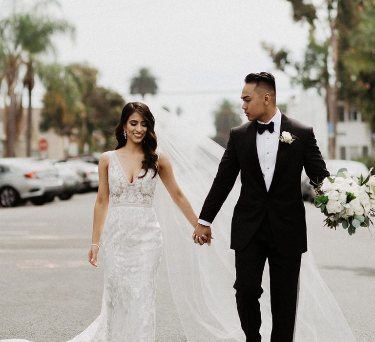 Bride and groom at black and white colour scheme wedding in LA