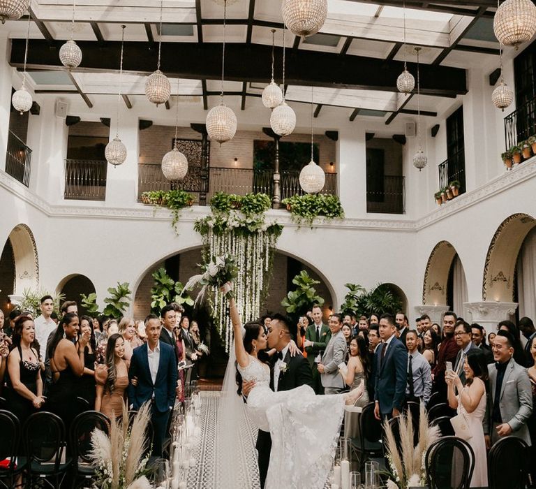 Bride and groom at black and white colour scheme wedding