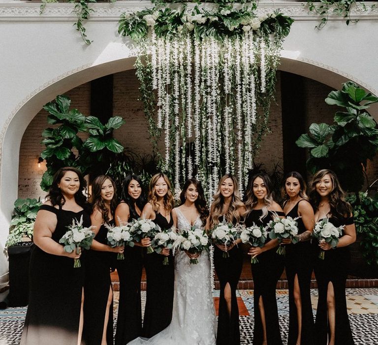 Black and white colour scheme for wedding with black bridesmaid dresses