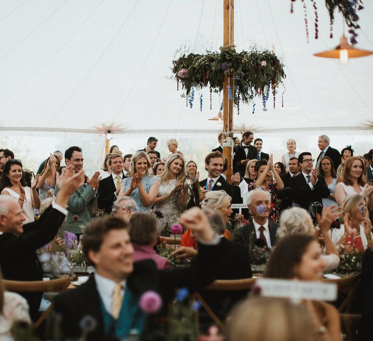 Sailcloth Tent Wedding With Floral Chandeliers // James Frost Photography