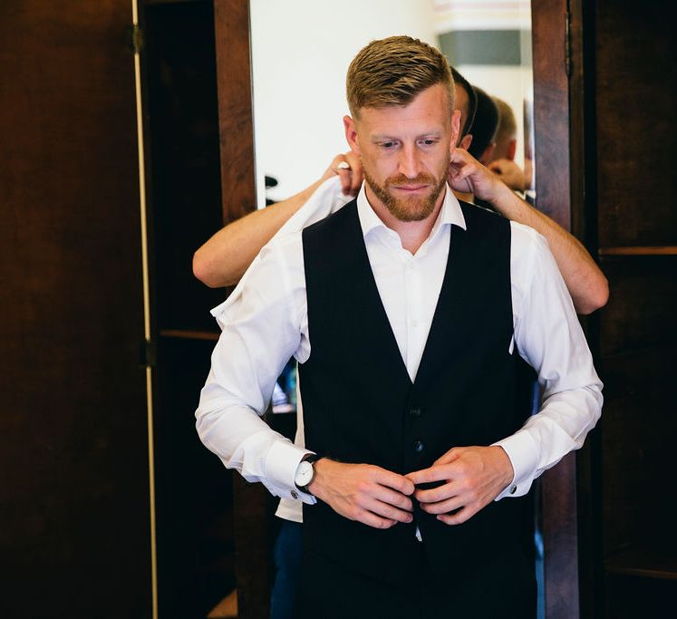 Wedding Morning Preparations | Groom Getting Dressed | Dark Navy Hugo Boss Suit with Waistcoat | Puglian Countryside Wedding with Fairy Light Altar and Olive Grove Aperitivo | Figtree Wedding Photography